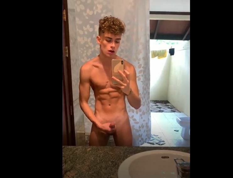 Romeo Twink jerks and cums in bathroom - OnlyGayPorn