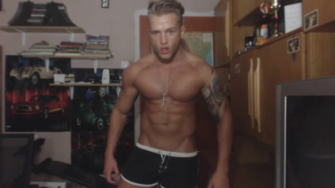 Alpha male flexing in tight swim shorts - OnlyGayPorn