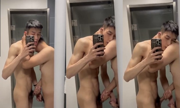 Two Men Jerking Each Other Off in Bathroom